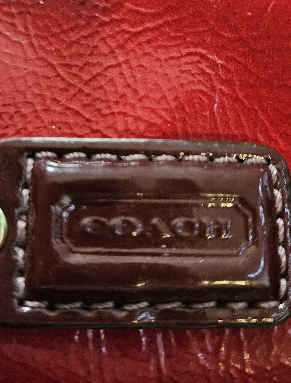 Coach Poppy Red Patent Wristlet with Brass Accents, Minor Callouts, Clean Inside